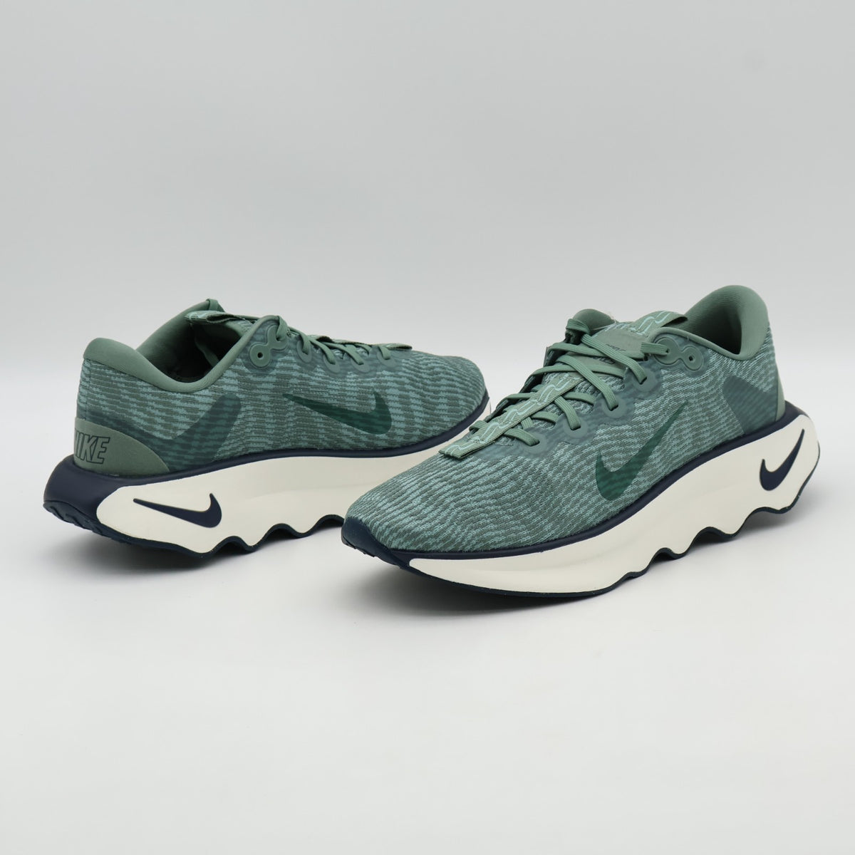 DV1237-301 Nike Motiva Clay Green Cannon Armory Navy Clay Green (Men's)