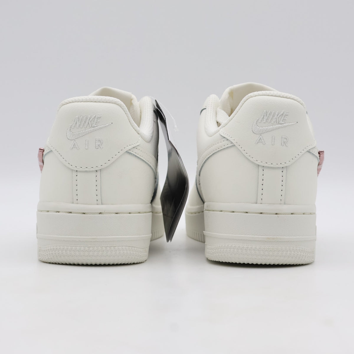 IF1686-161 Nike Air Force 1 Low Metallic Pink Swooshes (Women's)