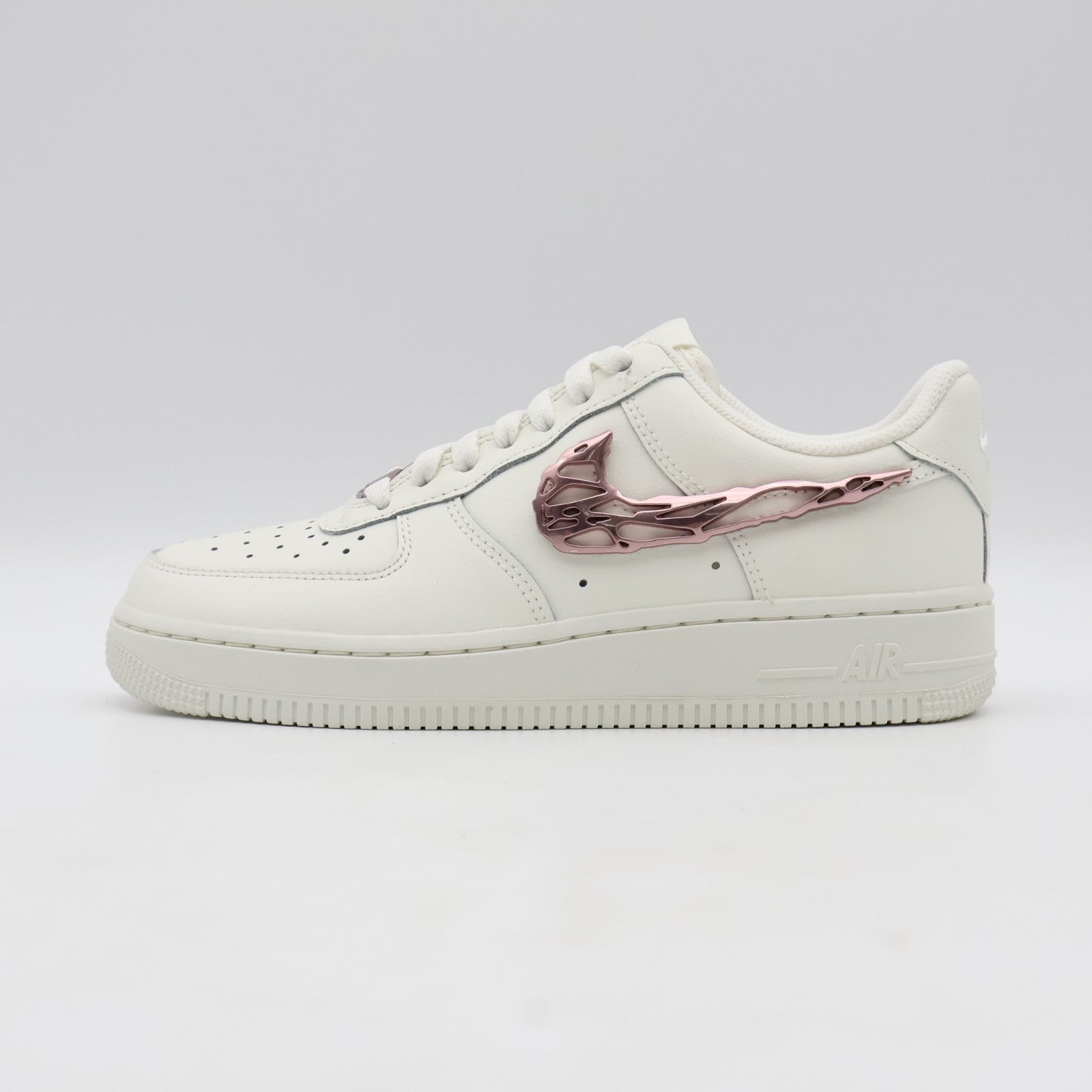 IF1686-161 Nike Air Force 1 Low Metallic Pink Swooshes (Women's)