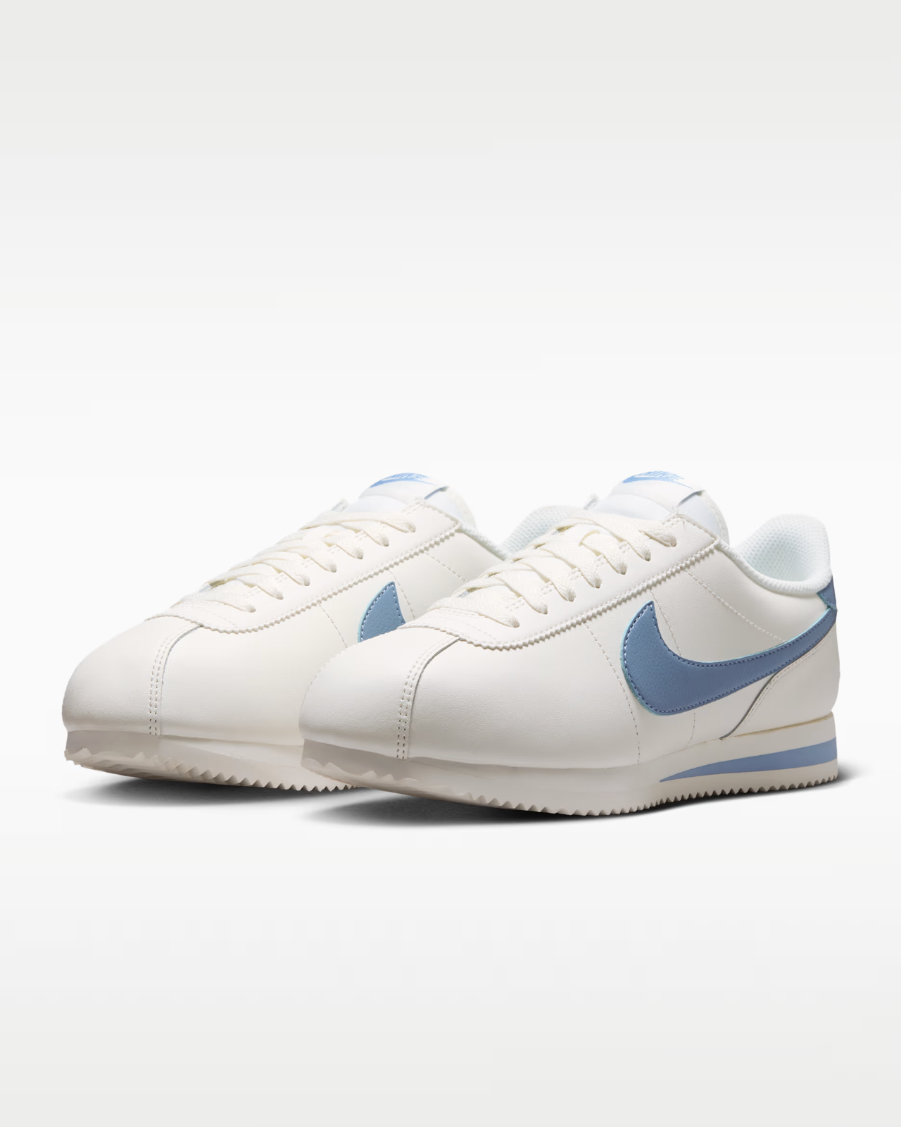 DN1791-119 Nike Cortez Leather "Sail/Work Blue" (Women's)