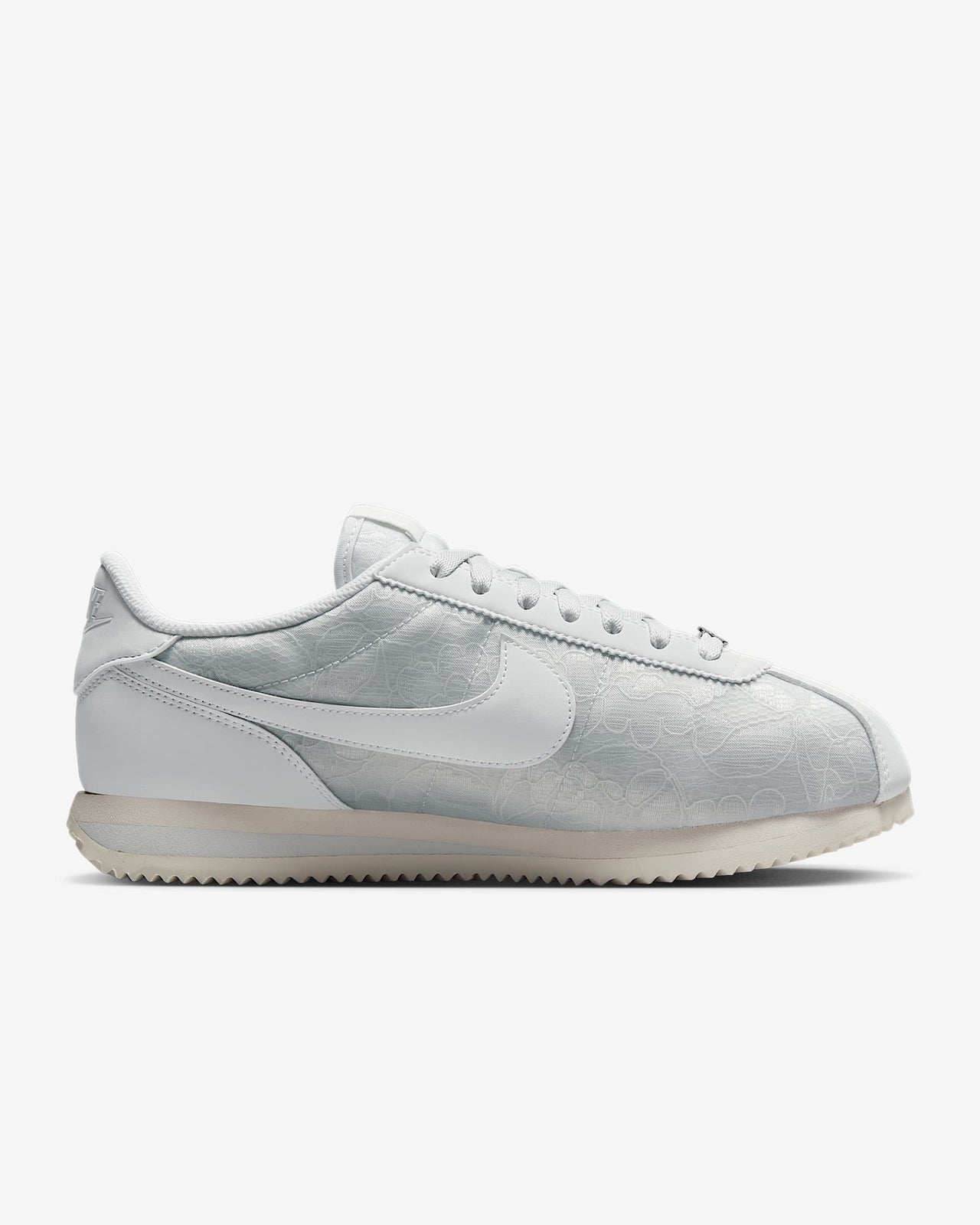 HM8286-001 Nike Cortez Platinum Tint Floral (Women's)