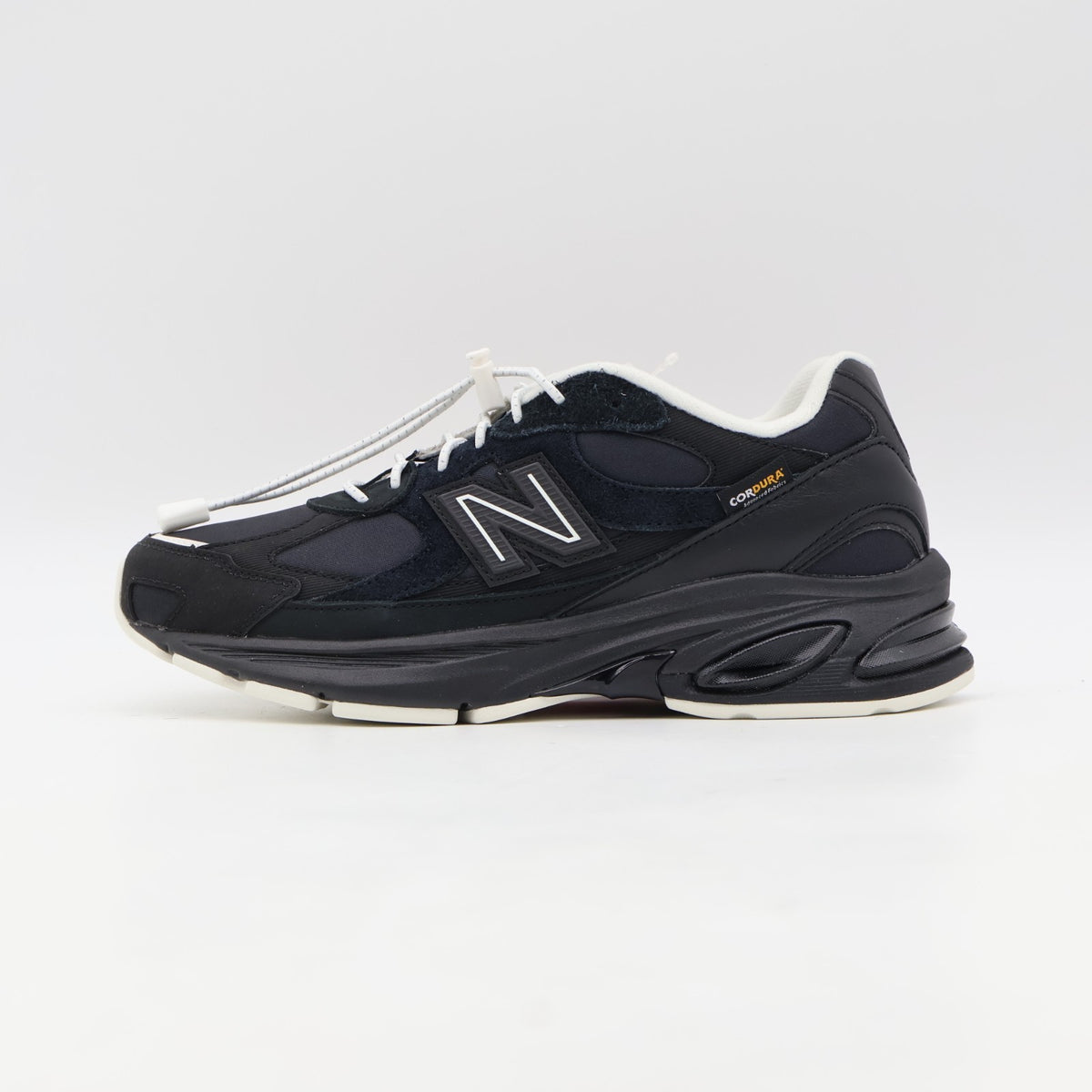 U20108ZK DOE Ã New Balance 2010 "Black/Sea Salt" (Men's)