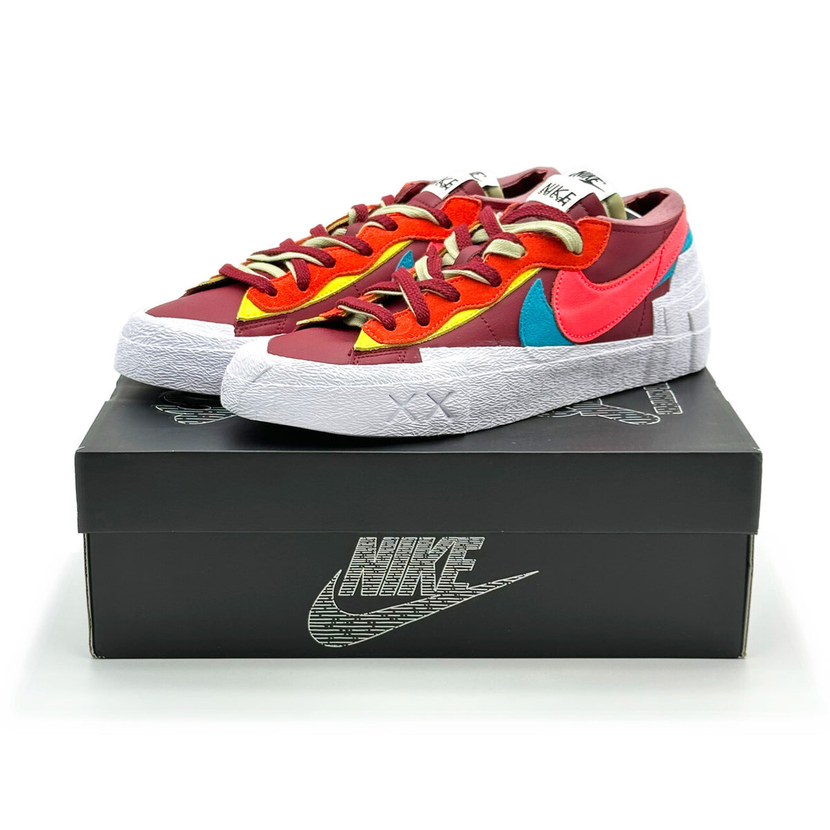 DM7901-600 KAWS sacai Nike Blazer Low Team Red White Maroon Pink Blue (Men's)