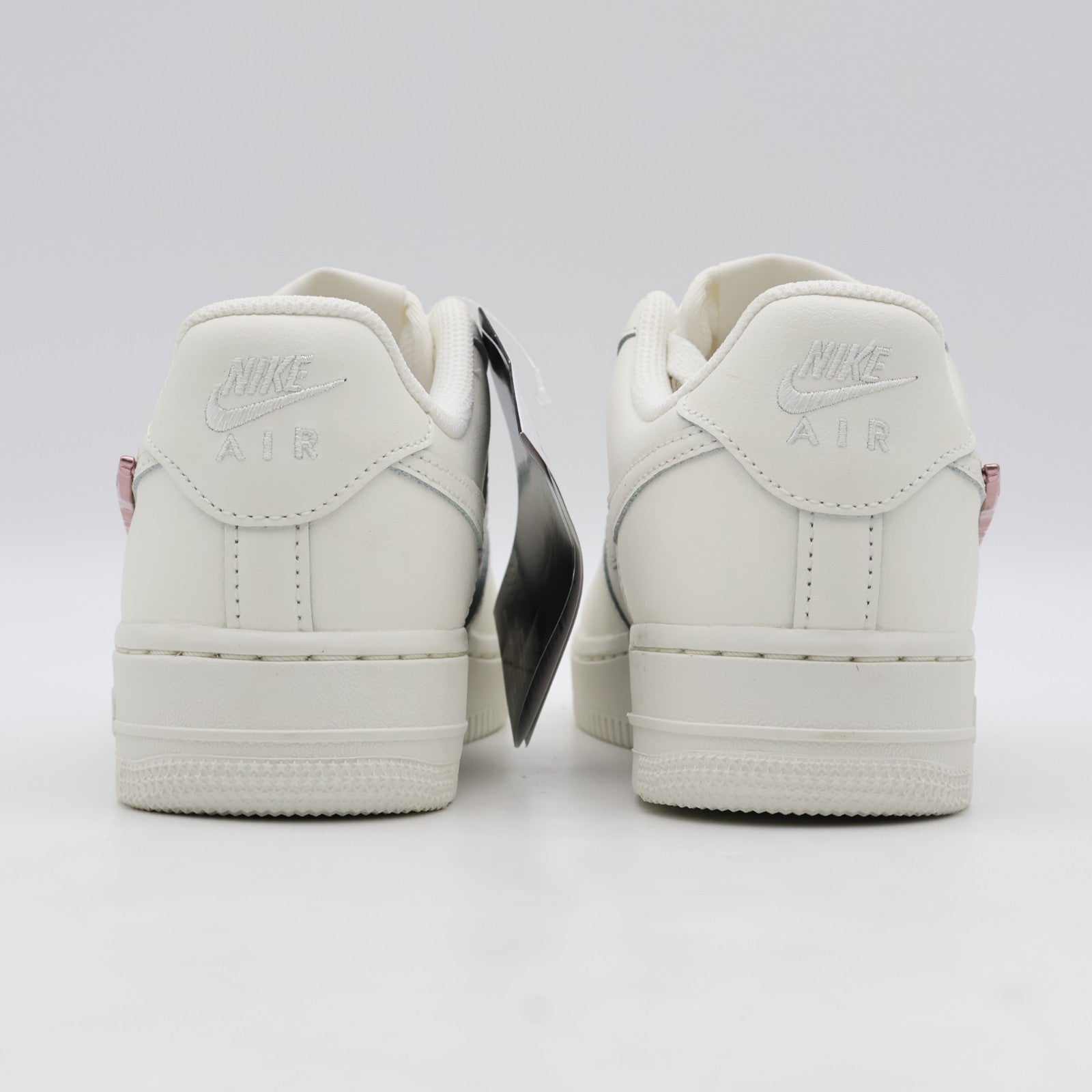 IF1686-161 Nike Air Force 1 Low Metallic Pink Swooshes (Women's)