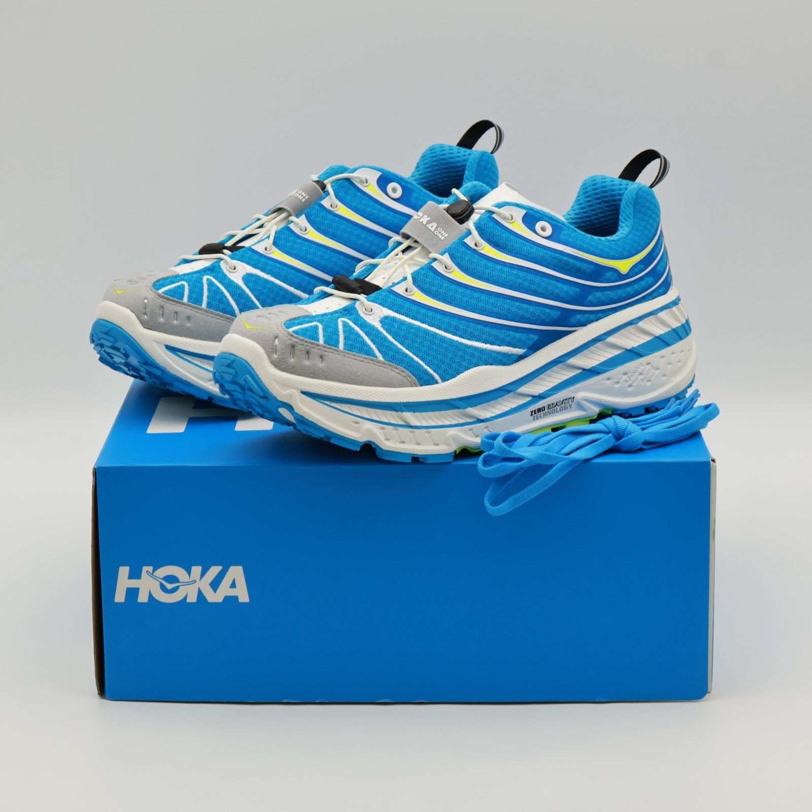 1155350-SHK Hoka Stinson Evo OG Skyward Blue Hoka Citrus (Men's)