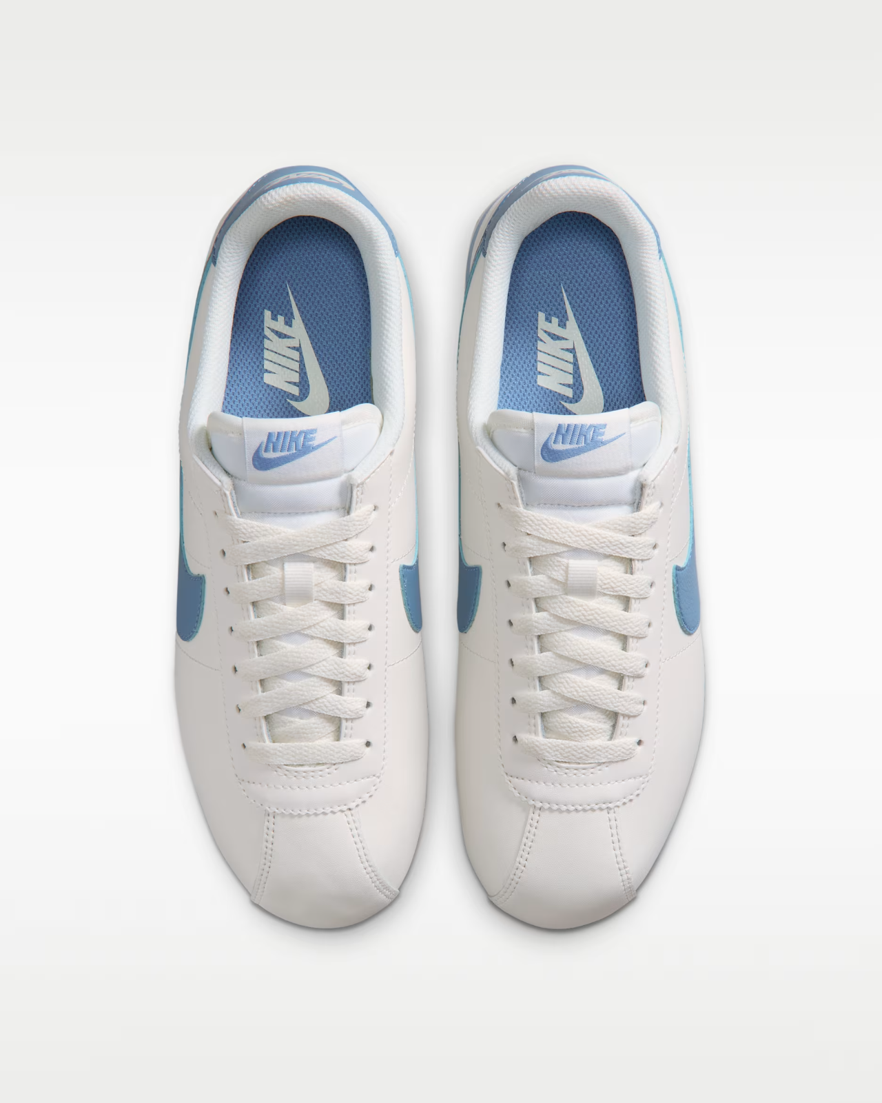 DN1791-119 Nike Cortez Leather "Sail/Work Blue" (Women's)