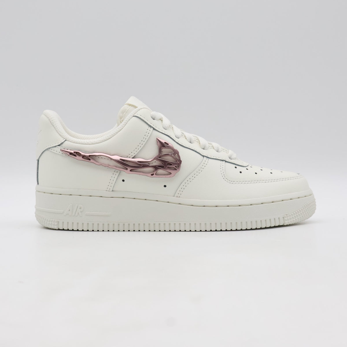 IF1686-161 Nike Air Force 1 Low Metallic Pink Swooshes (Women's)
