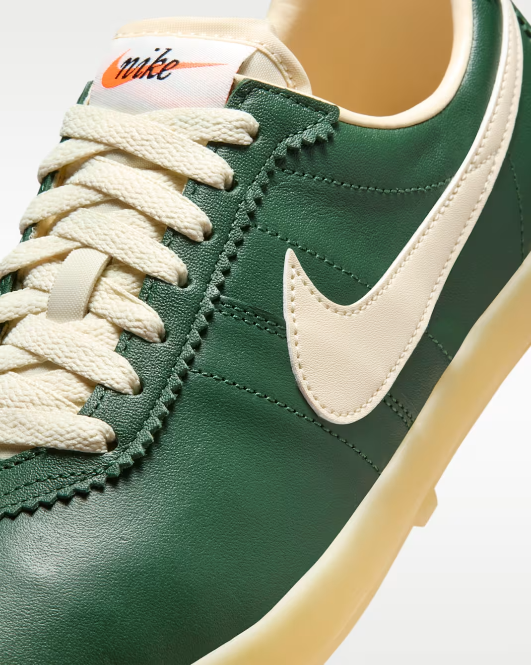 II1259-300 Nike Astro Grabber Leather Fir Sail Muslin (Women's)