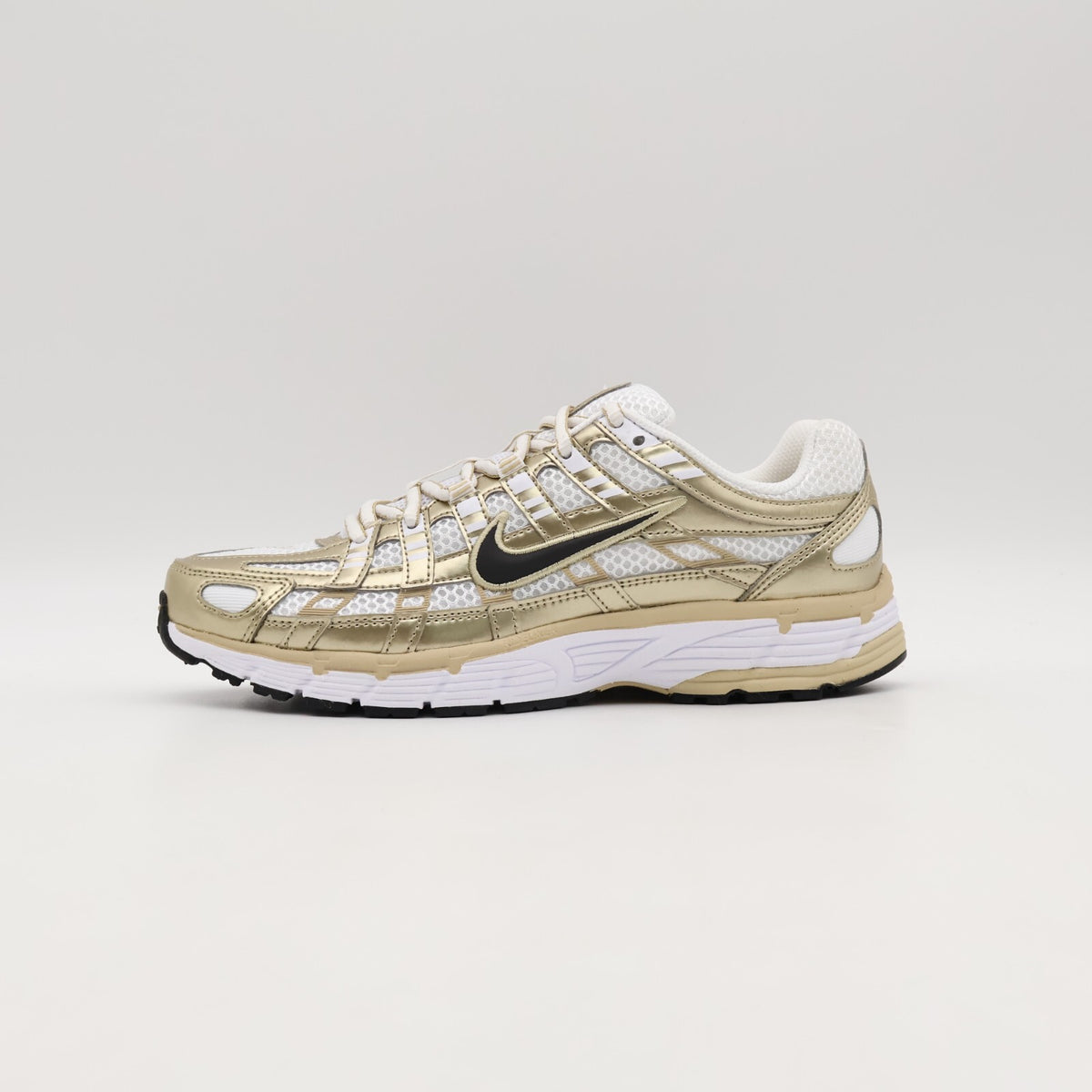 IF1787-100 Nike P-6000 Gold (Women's)