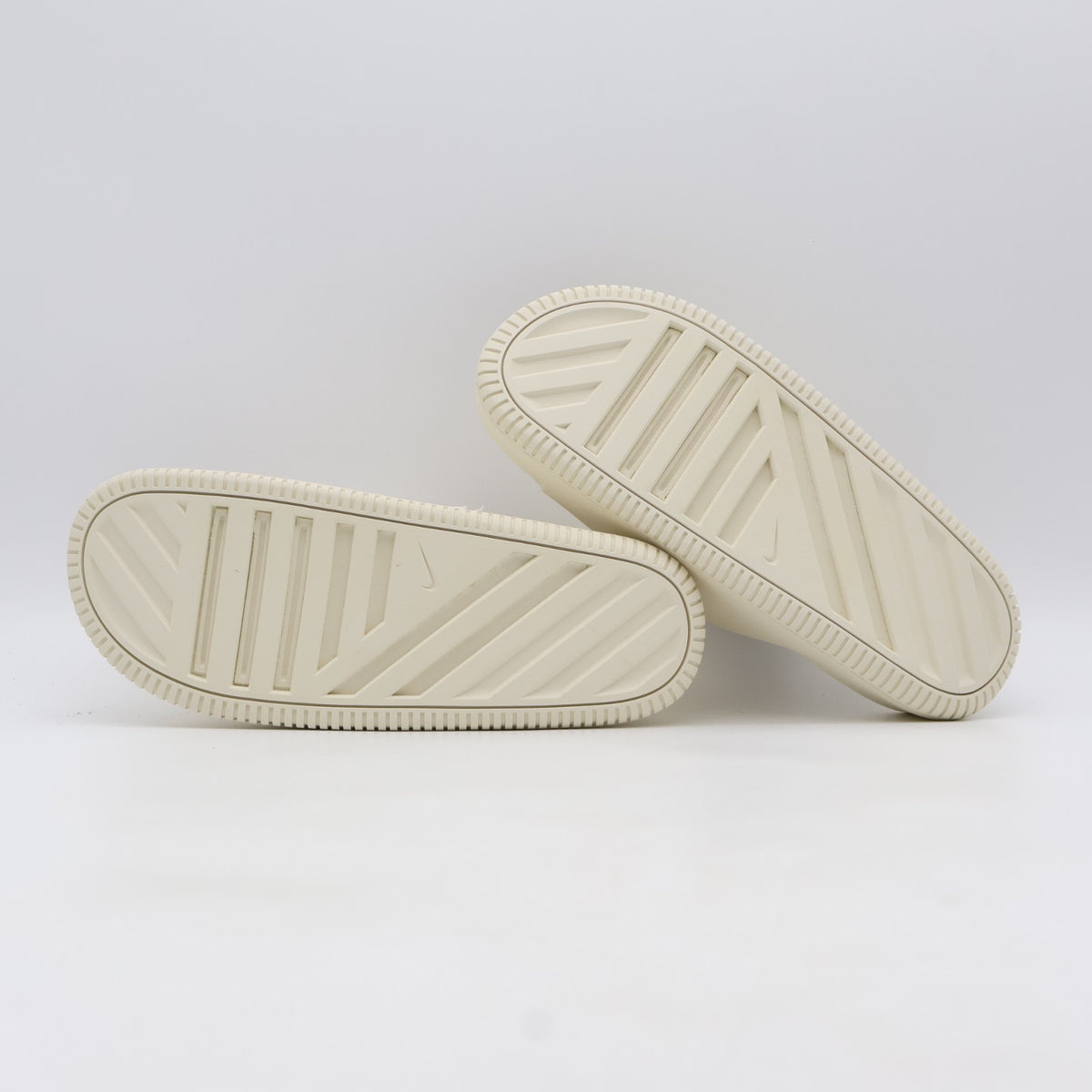 IB0183-101 Nike Calm 2.0 Slide Coconut Milk (Men's)
