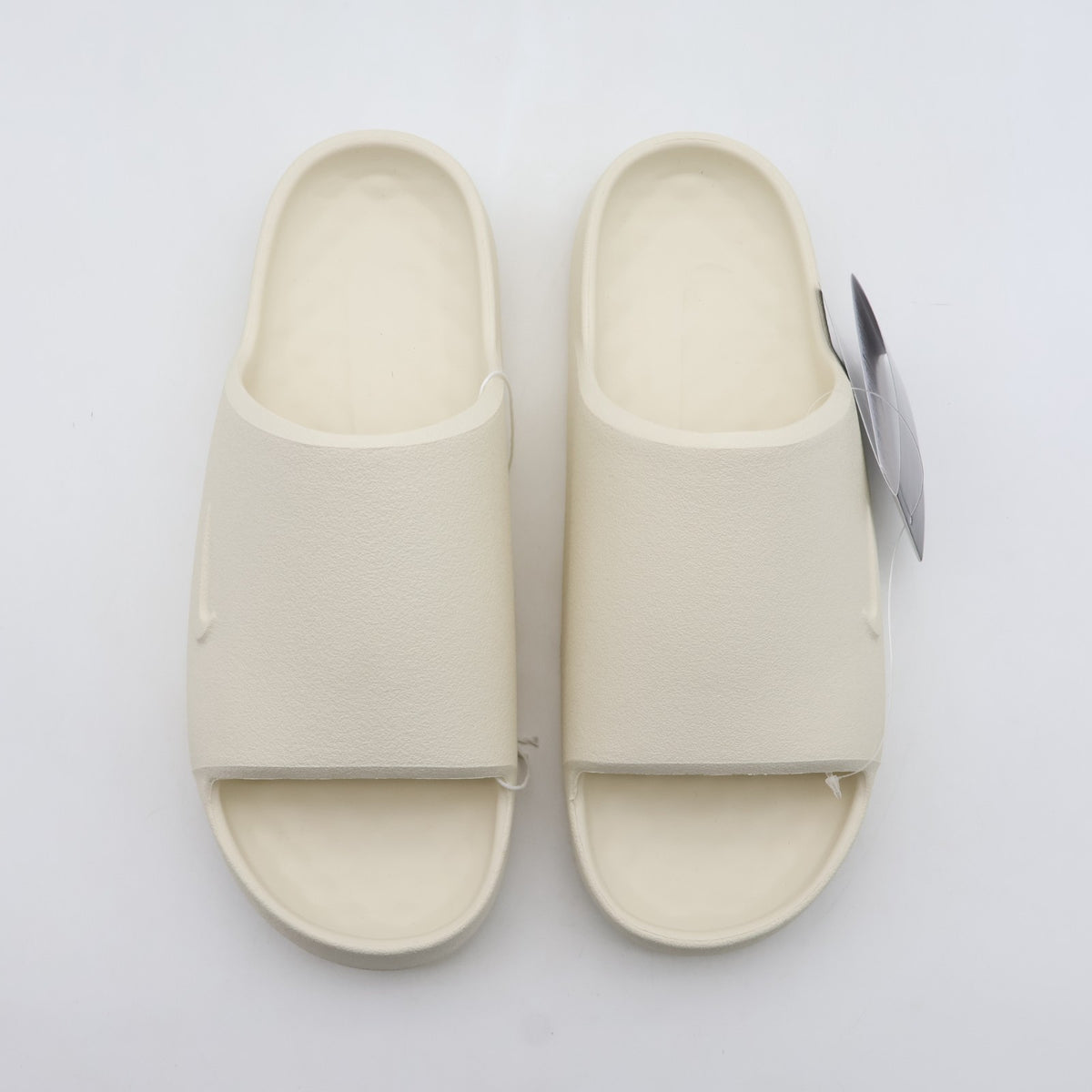 IB0183-101 Nike Calm 2.0 Slide Coconut Milk (Men's)