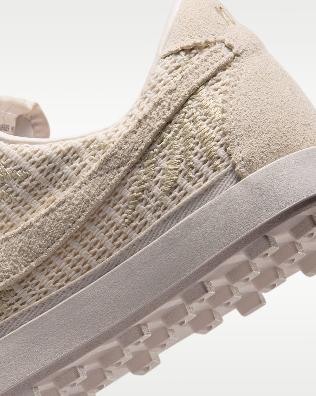 IW4937-006 Nike Astro Grabber Textile Phantom (Women's)
