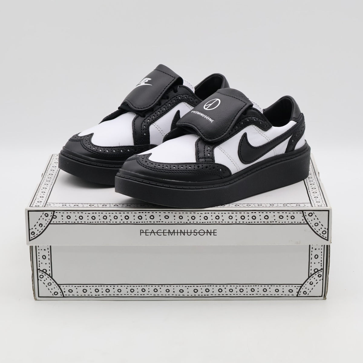 DH2482-101 PEACEMINUSONE Ã Nike Kwondo 1 G-Dragon Panda Wingtip Leather Dress