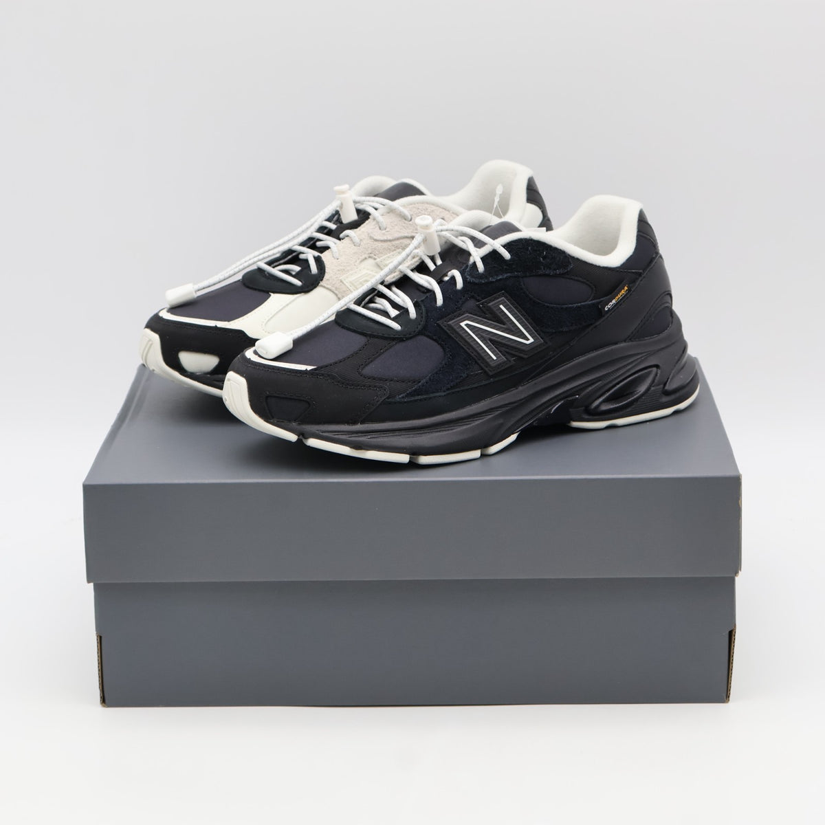 U20108ZK DOE Ã New Balance 2010 "Black/Sea Salt" (Men's)