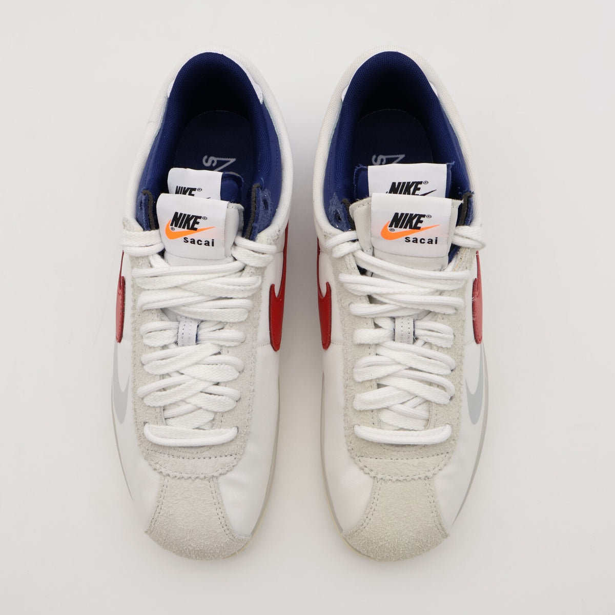 DQ0581-100 sacai Nike Zoom Cortez White University Red Blue Light Cream (Men's)