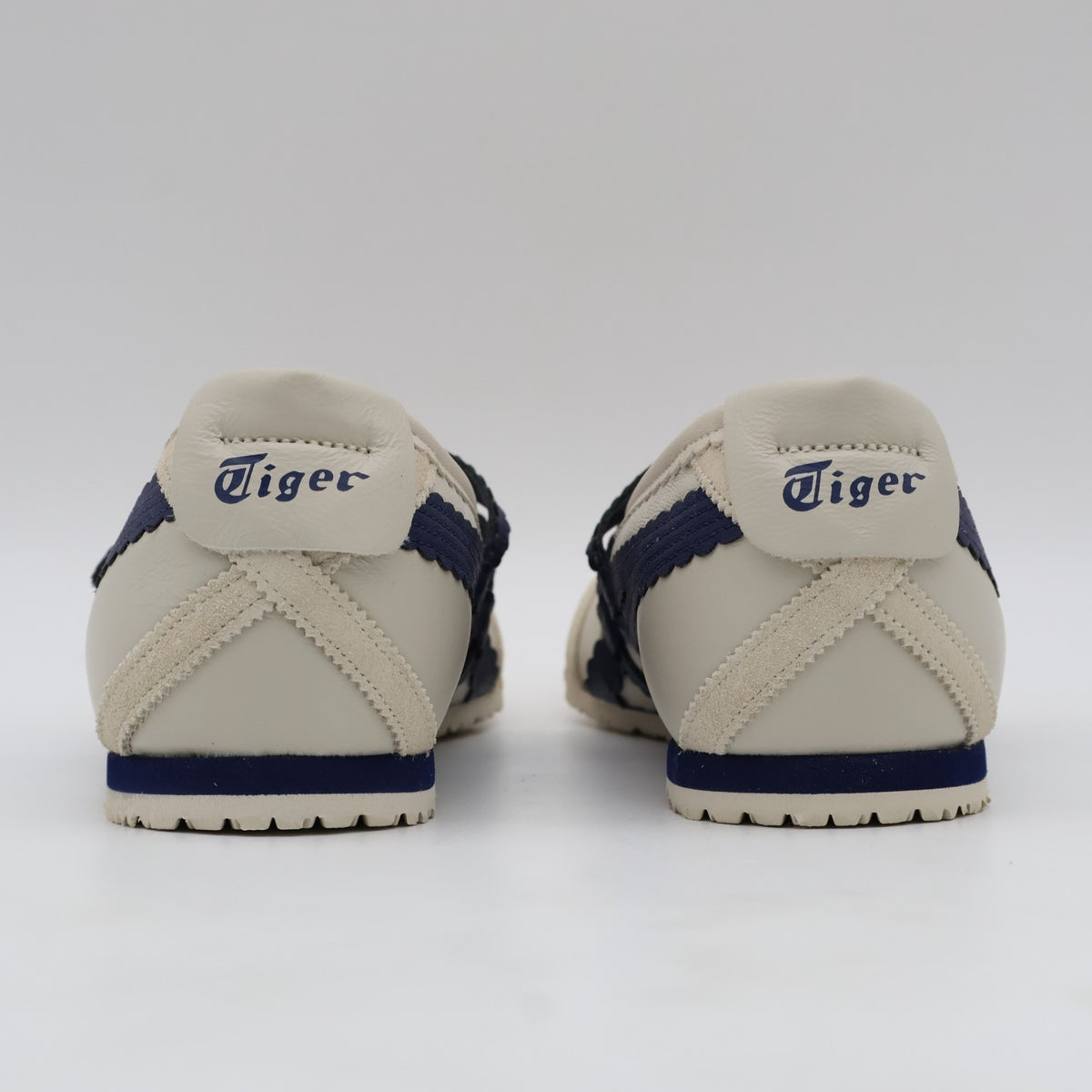 1182A678-200 Onitsuka Tiger Mexico 66 TGRS Birch Peacoat (Women's)