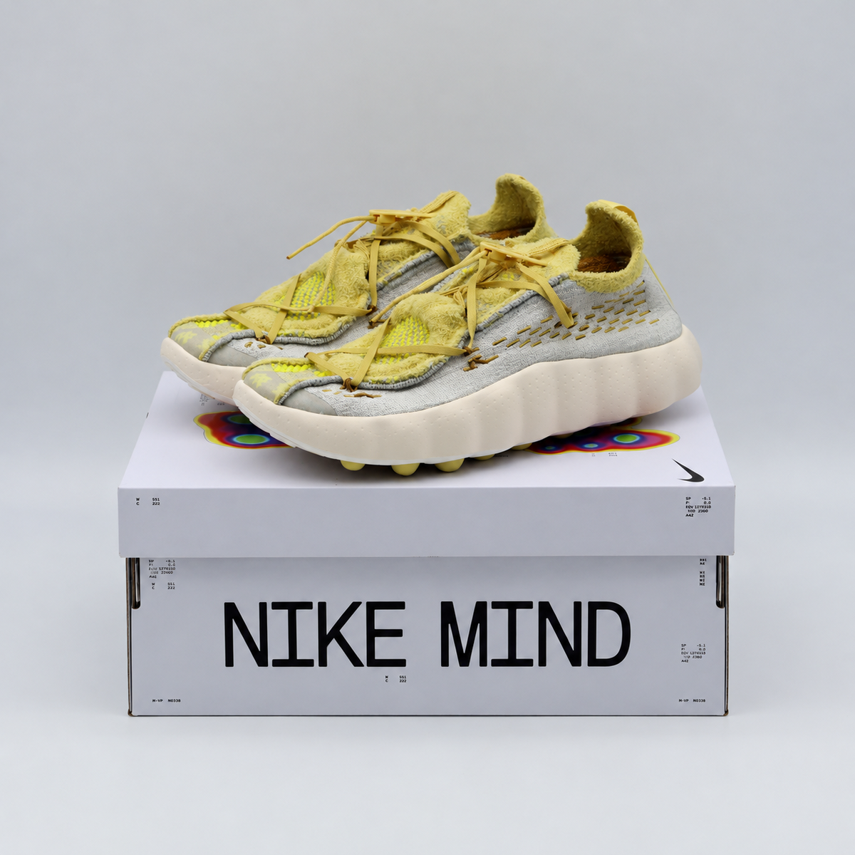IR2176-003 Nike Mind 002 Flyknit Light Bone Saturn Gold (Men's)