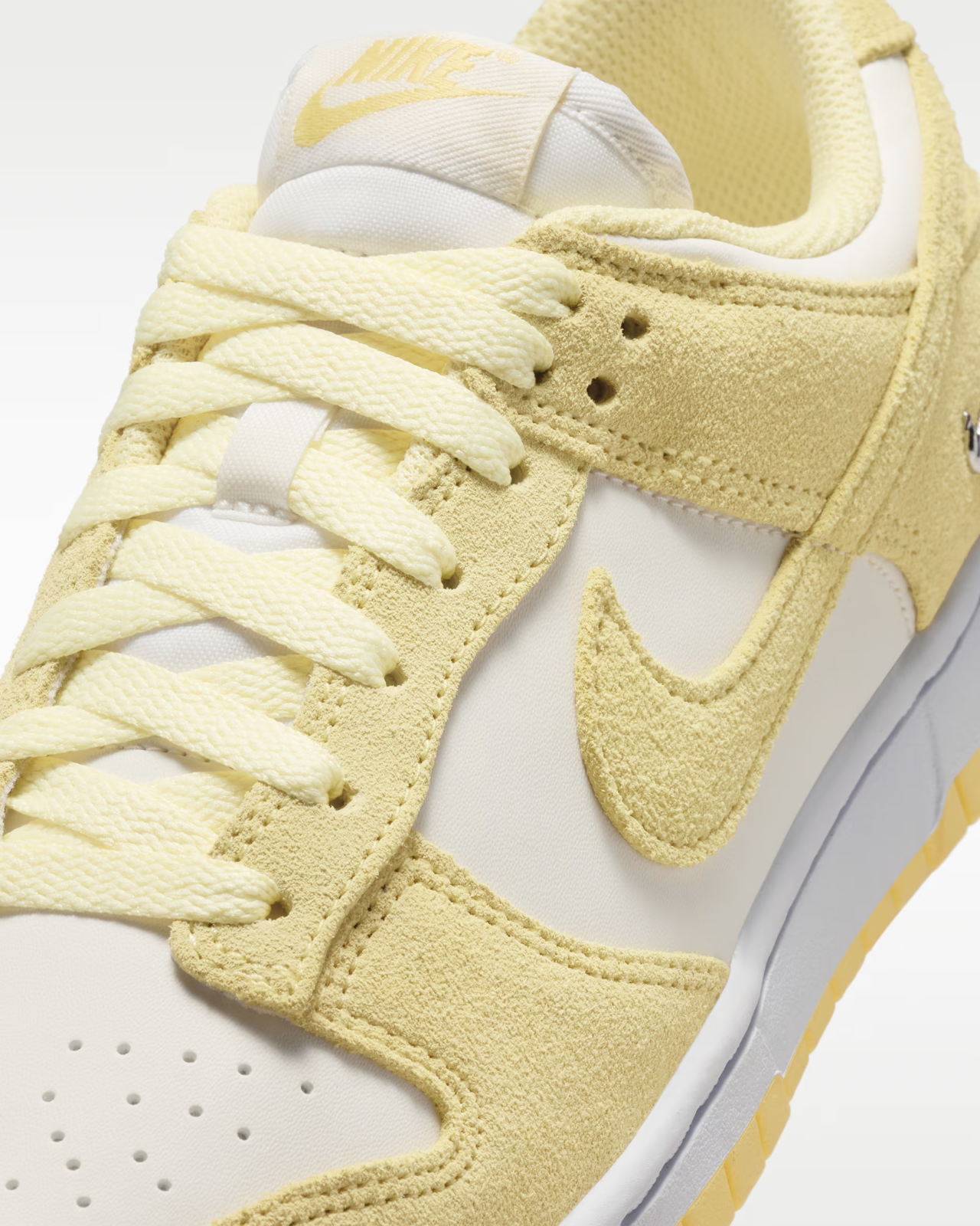 IO4244-104 Nike Dunk Low "Sail/Soft Yellow" (Women's)