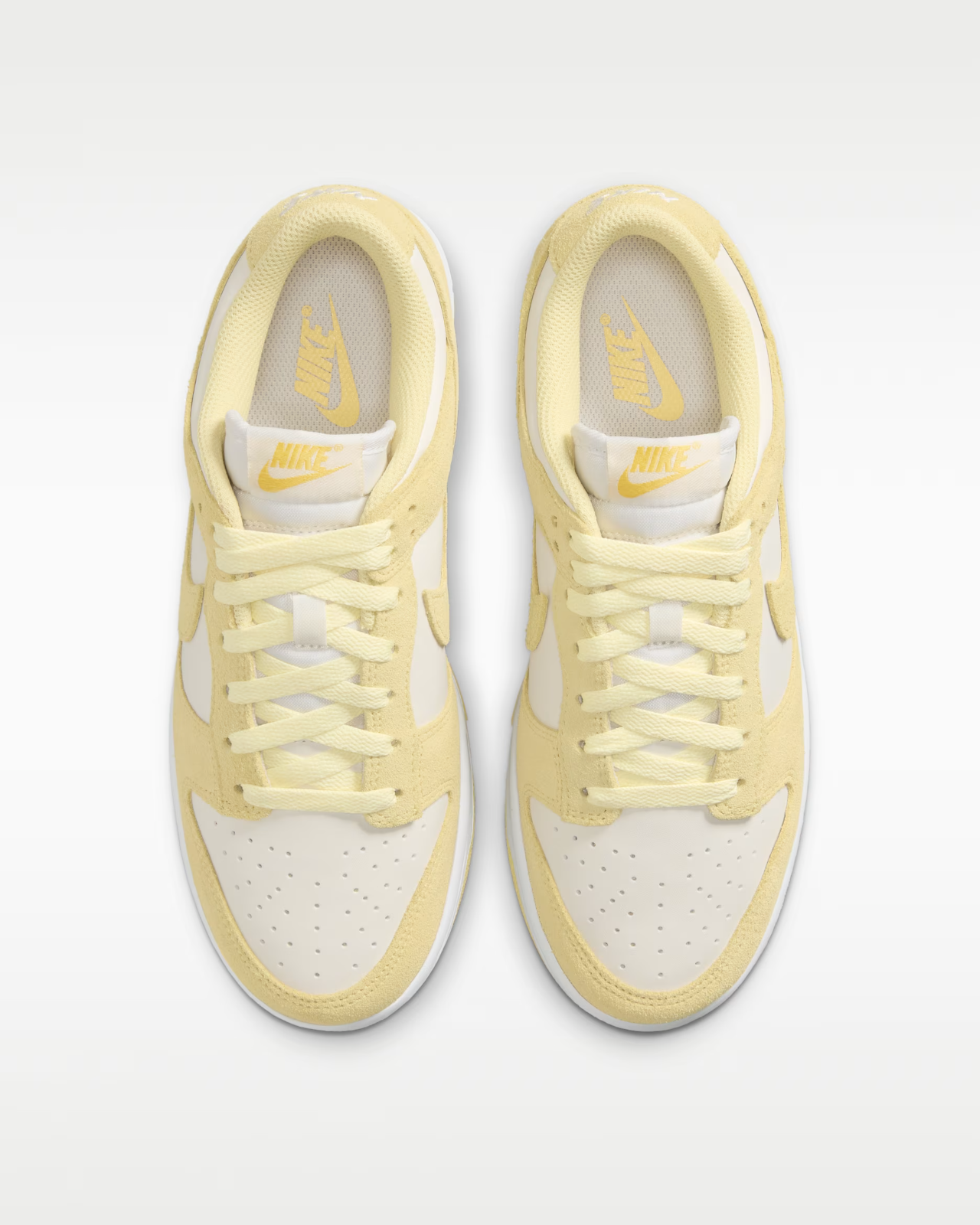 IO4244-104 Nike Dunk Low "Sail/Soft Yellow" (Women's)