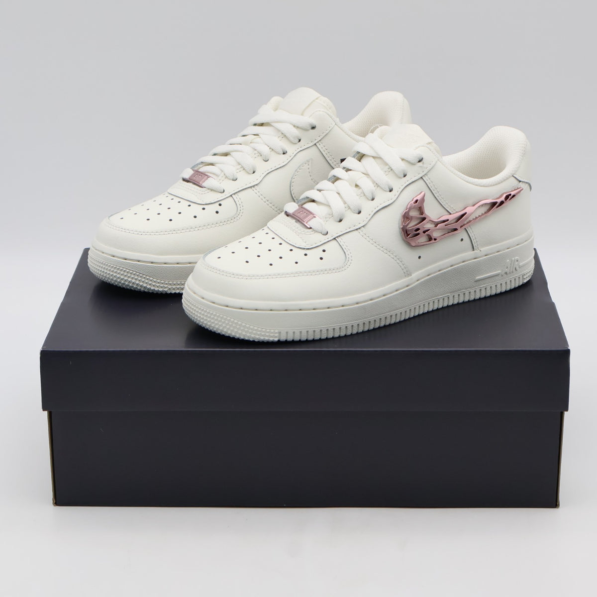 IF1686-161 Nike Air Force 1 Low Metallic Pink Swooshes (Women's)