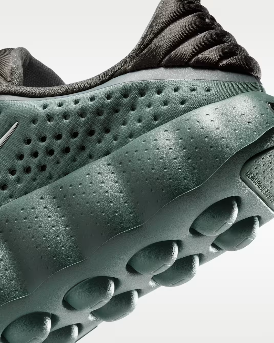 HQ4308-300 Nike Mind 002 "Camo Green/Newsprint" (Men's)