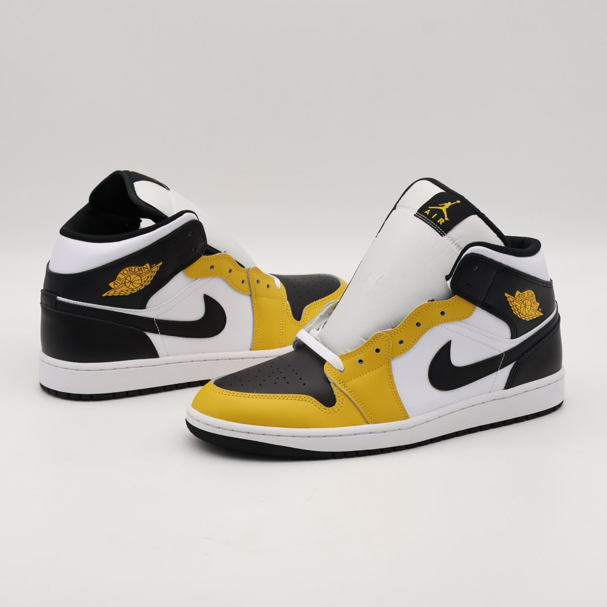 DQ8426-701 Nike Air Jordan 1 Mid Yellow Ochre (Men's)