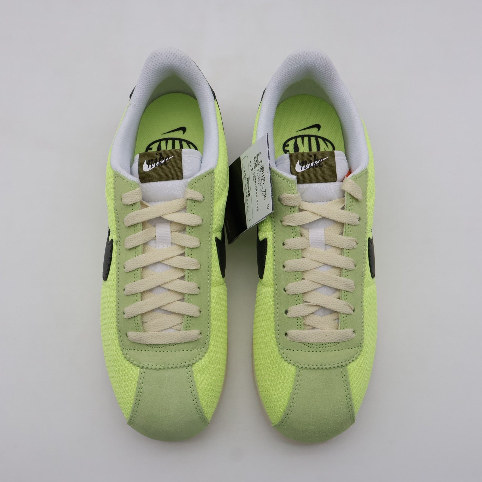 IB8135-736 NIKE CORTEZ TXT LT LEMON TWIST/BLACK-COCONUT MILK-WHITE (Men's)