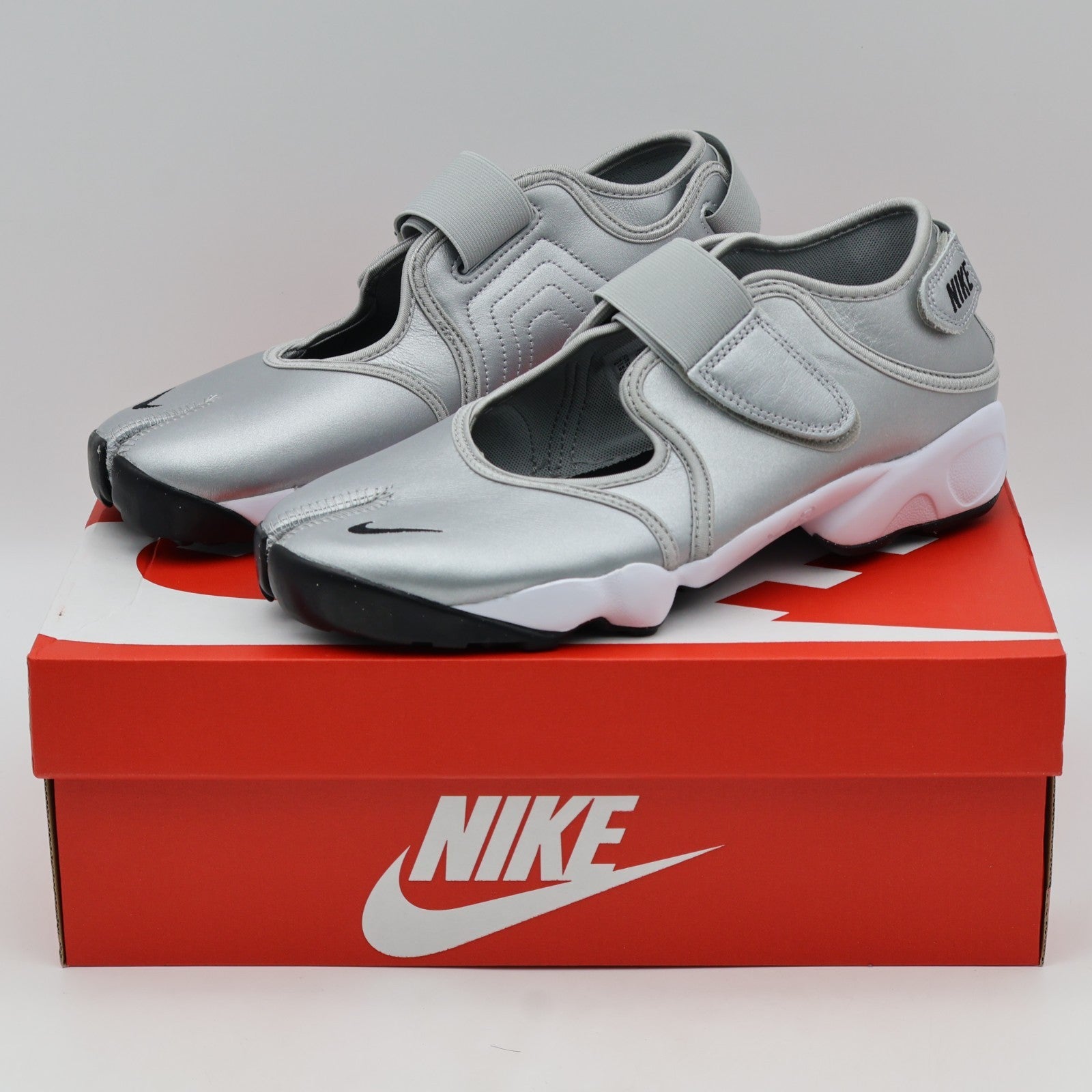 HM5737-003 Nike Air Rift Leather Metallic Silver (Women's)