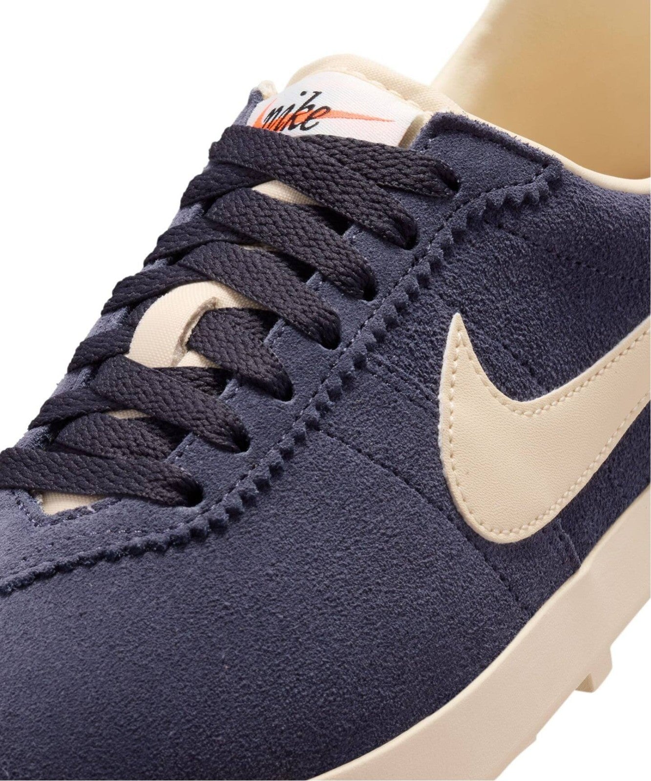 IQ7611-002 Nike Astrograbber Suede "Gridiron/Sail" (Women's)