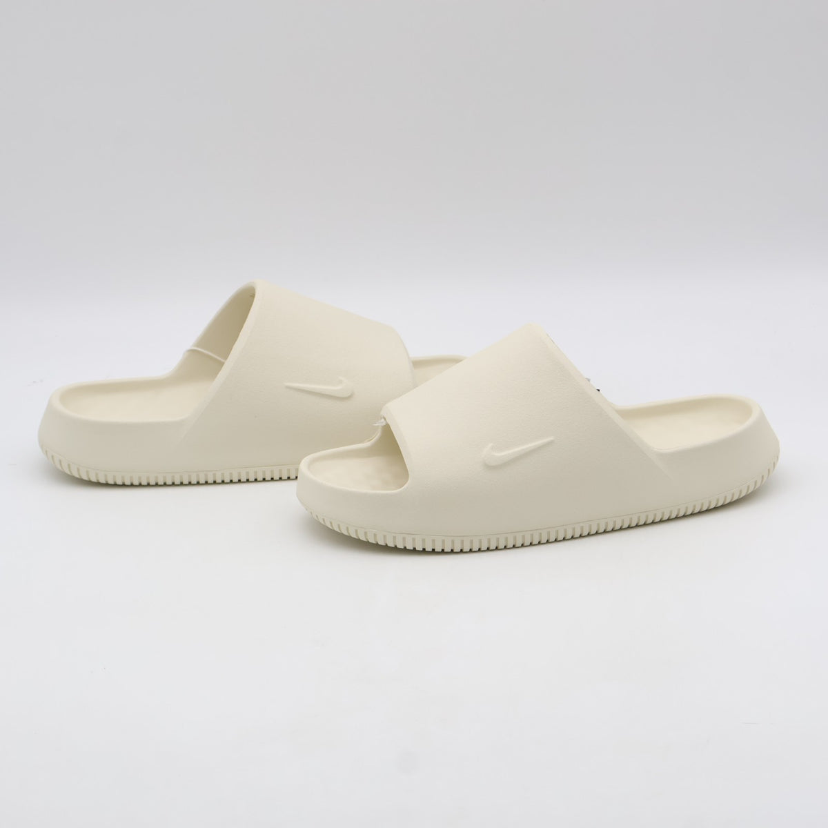 IB0183-101 Nike Calm 2.0 Slide Coconut Milk (Men's)