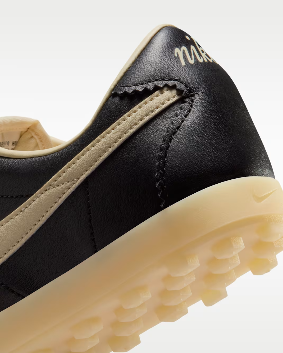 II1259-001 Nike Astro Grabber Leather Black (Women's)