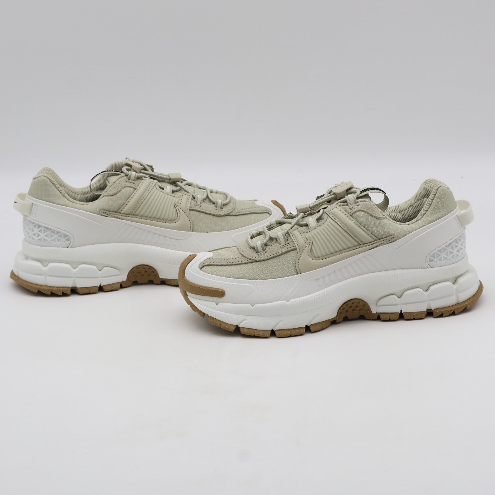 HQ2181-100 Nike Zoom Vomero Roam Sail Gum Light Brown Racer Blue (Women's)