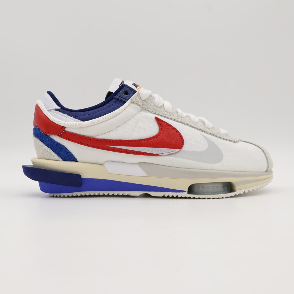 DQ0581-100 sacai Nike Zoom Cortez White University Red Blue Light Cream (Men's)